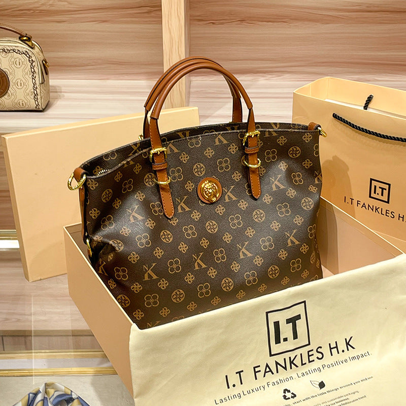 Large capacity shoulder bag, genuine leather, suitable for commuting, hand-held, crossbody, or tote bag.